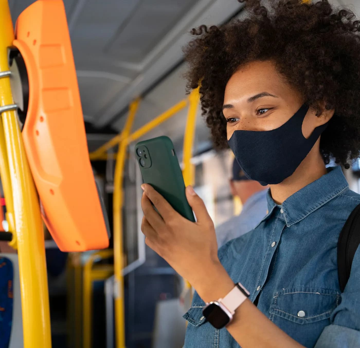 Woman using Weyz on a bus